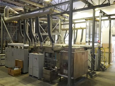 Automatic single-row line for galvanic copper plating on steel hinges.
