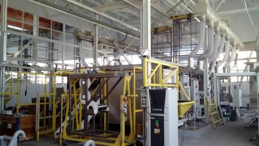Automatic two-row line for titanium casting on hinges and drums.